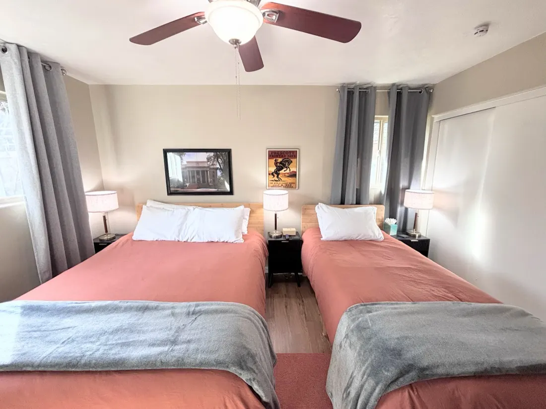 Beds, headboards and nightstands assembled in a guest bedroom