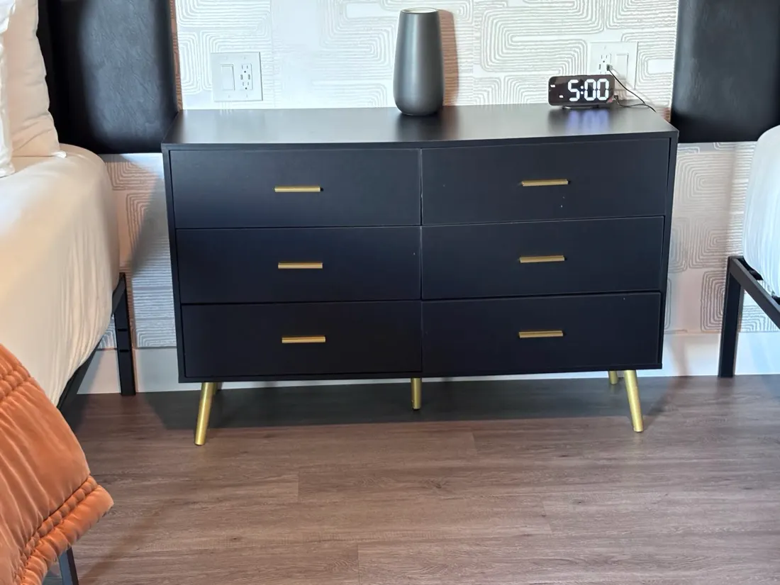 Six-drawer dresser with gold legs and pulls
