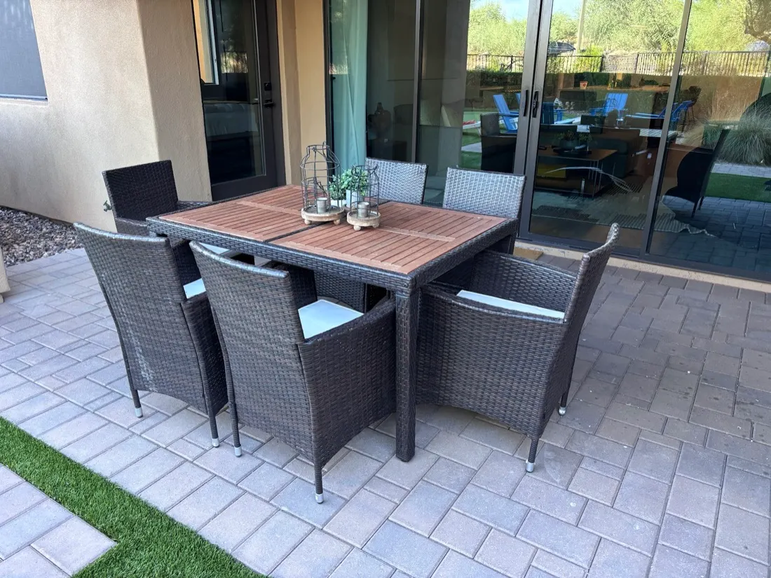 Wicker patio dining table and six chairs