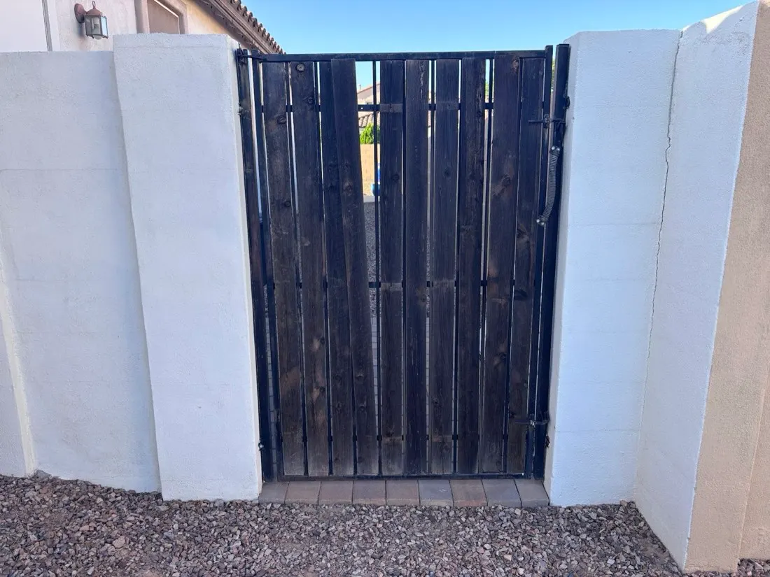Gate with redwood slats: before