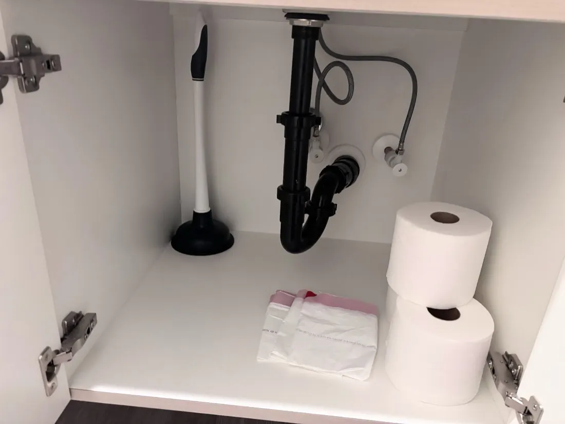 Dry, leak-free drain and supply lines under a bathroom sink