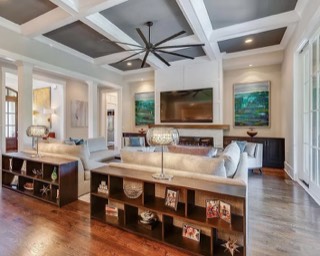 Large ceiling fan on a coffered great room ceiling