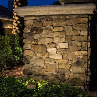 Low-voltage LED wash light on a stacked stone column